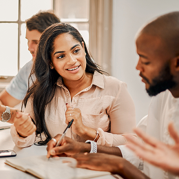 a group of people in discussion