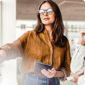 How AI is rewriting digital delivery blog cover image with a women seen in discussion