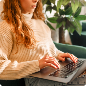 A person is working on a laptop