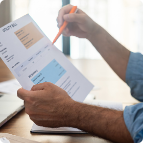 A person checking a document